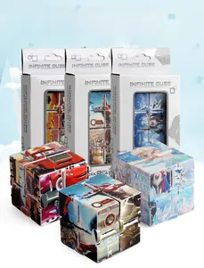 Macro shot of colorful Infinity Cube puzzle toys with character designs and box packaging