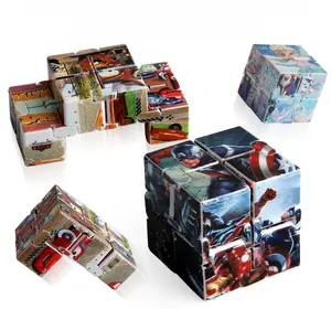 Detailed macro view showing multiple foldable infinity cube toys with cartoon patterns