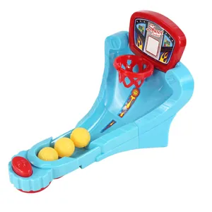 Miniature tabletop basketball game toy with red launcher and blue court for kids