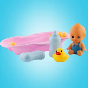Baby doll bath toy set with pink tub, yellow rubber duck, and soap model for water play