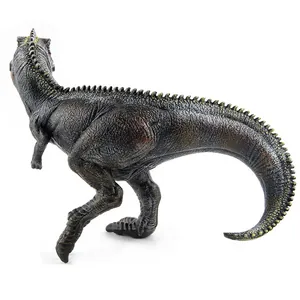 Detailed view of the realistic skin texture and red markings on a Giganotosaurus dinosaur toy