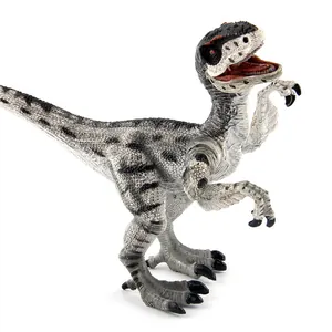 Modèle réaliste de dinosaure Vélociraptor en gris et blanc avec des rayures
