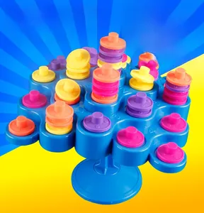 Macro detail of multi-color stackable pieces on blue balancing tower game board