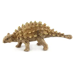 Detailed close-up showing the scaly skin texture and yellow spikes of the ankylosaurus toy