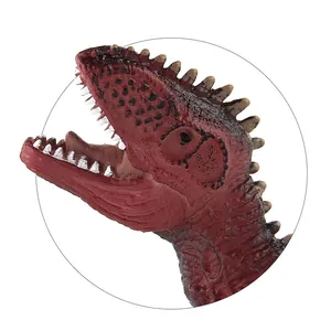 Detailed close-up of a Carnotaurus dinosaur toy head with realistic skin texture