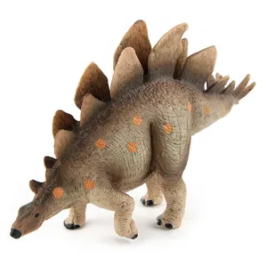 Detailed macro view of Stegosaurus dinosaur toy with realistic scale textures and orange spots