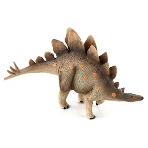 Detail view of Stegosaurus dinosaur toy with realistic skin texture and orange spots
