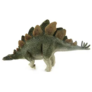 Detailed view of green Stegosaurus dinosaur toy with realistic scales and brown dorsal plates