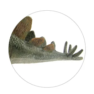Detailed macro view of the spiked tail and skin texture of a Stegosaurus dinosaur toy