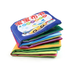 Educational cloth book for babies featuring colorful vehicles and soft sensory pages