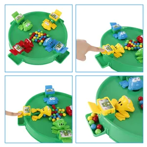 Multiplayer feeding frog board game with four colorful frogs and marble eating action