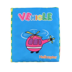 Detail of vehicle cloth book featuring a pink helicopter and crinkle paper texture