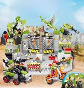 Military base toy set with soldiers, vehicles, and a storage box lid building plate