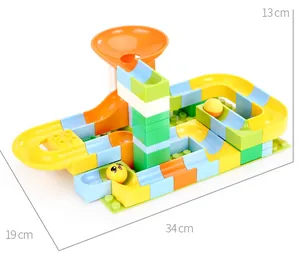 Detailed view of colorful large building block slide with marble run and size dimensions