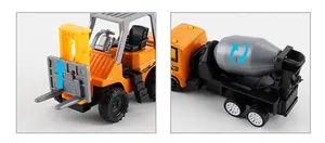 Detail view of mini forklift and cement mixer toy with movable parts and orange finish