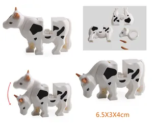 Detailed assembly view of toy cow building block showing movable head and dimensions