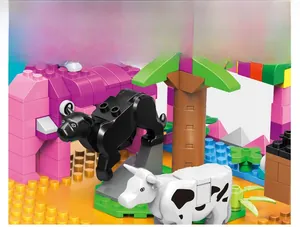 Detail of smooth leopard and cow animal building blocks with rounded edges for kids