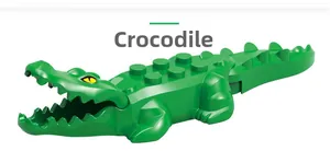 Detailed close-up of a green crocodile building block toy with movable jaw and tail segments