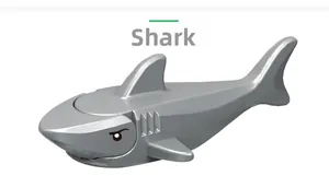 Detail of grey shark shaped building block toy accessory made of polished ABS plastic