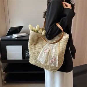 Large capacity woven straw tote bag with brown leather handles for summer beach vacations