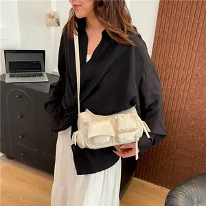 Chic cream white motorcycle bag with multi-pocket oil wax leather and slim strap
