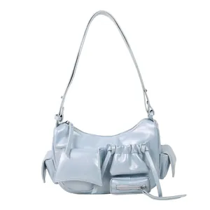 Light blue oil wax leather motorcycle shoulder bag with vintage utilitarian pockets