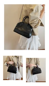 Détails macro d'un sac à main en cuir noir brillant avec des accessoires argentés