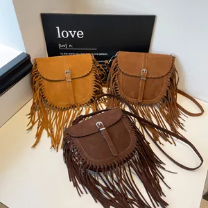 Bohemian suede saddle bags with long fringe in khaki, camel, and coffee colors
