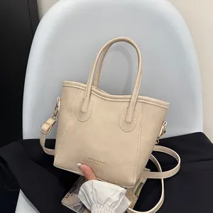 Retro beige large capacity tote bag with gold lettering and adjustable shoulder strap