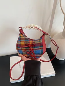 Mini plaid crossbody bag with red bows, lace handle and adjustable shoulder strap