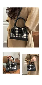Detail shots of plaid bucket bag with black handles and adjustable shoulder strap