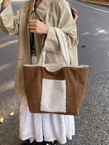 Winter large capacity tote bag in brown suede with white sherpa fleece trim and handles