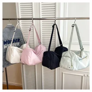 Lightweight large capacity sports gym bag and travel duffel in four versatile colors