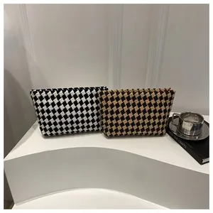 Checkerboard knit long wallet for women with zipper closure and woven texture