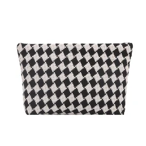 Chic houndstooth long wallet for women featuring a classic black and white woven pattern