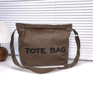 Vintage Women Canvas Tote Bag Large Capacity Letter Print Shoulder Bag Crossbody Handbag With Adjustable Strap For Daily Commute