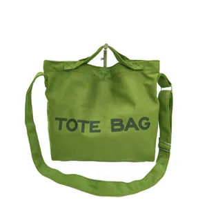 Olive green canvas tote bag with letter print and adjustable shoulder strap for women