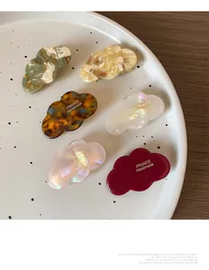 Lot de six barrettes nuage en acétate avec motifs marbrés et logo doré fait main France