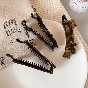 Fermagli a banana gatto in resina tartarugata e nero opaco per acconciature raffinate