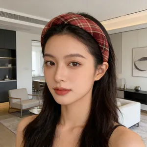 Elegant red plaid headband for women featuring a classic tartan pattern and high-volume top