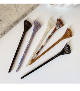 Detail of 6 colors acetate hair sticks with hollow fan design and small white pearls