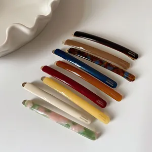 Elegant set of 9 slim acetate hair clips in assorted solid and tortoiseshell colors