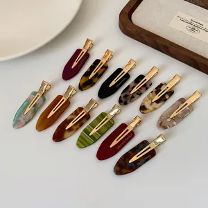 Set of 12 vintage acetate duckbill hair clips with colorful geometric marble textures