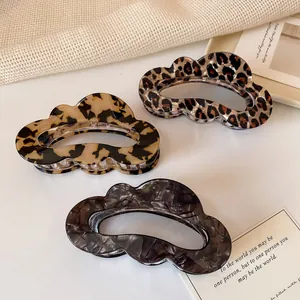 Leopard print and tortoise shell cloud hair claws for elegant updo hairstyles