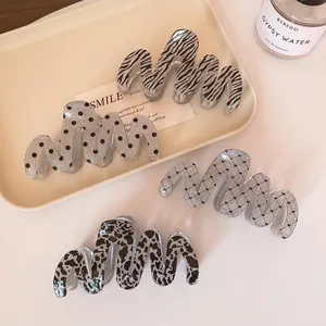 Elegant wave-shaped shark clips with glitter acrylic patterns for thick hair styling