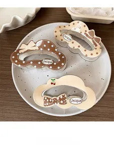 Three-piece set of cloud-shaped hair claws with polka dots, bows and cherry motifs