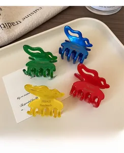 Lot de quatre pinces à cheveux en acétate brillant en vert, bleu, rouge et jaune doré