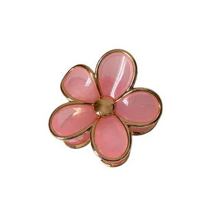 Pink gradient floral hair claw clip with golden edges for elegant hair styling