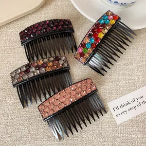Set di quattro pettini per capelli con strass scintillanti e decorazioni floreali colorate