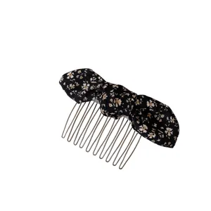 Elegant floral bow hair side comb with black fabric and yellow blossoms on metal teeth